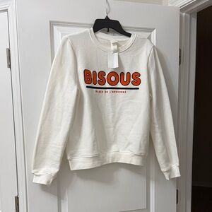 H&M White Sweatshirt with Orange "BISOUS" Text